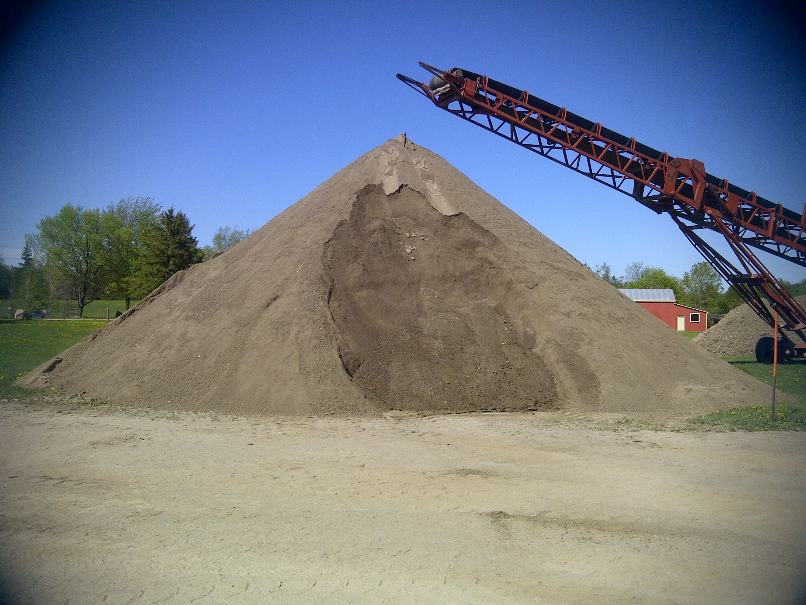 FRESHLY SCREENED TOPSOIL READY FOR YOUR LAWN OR LANDSCAPING PROJECT
